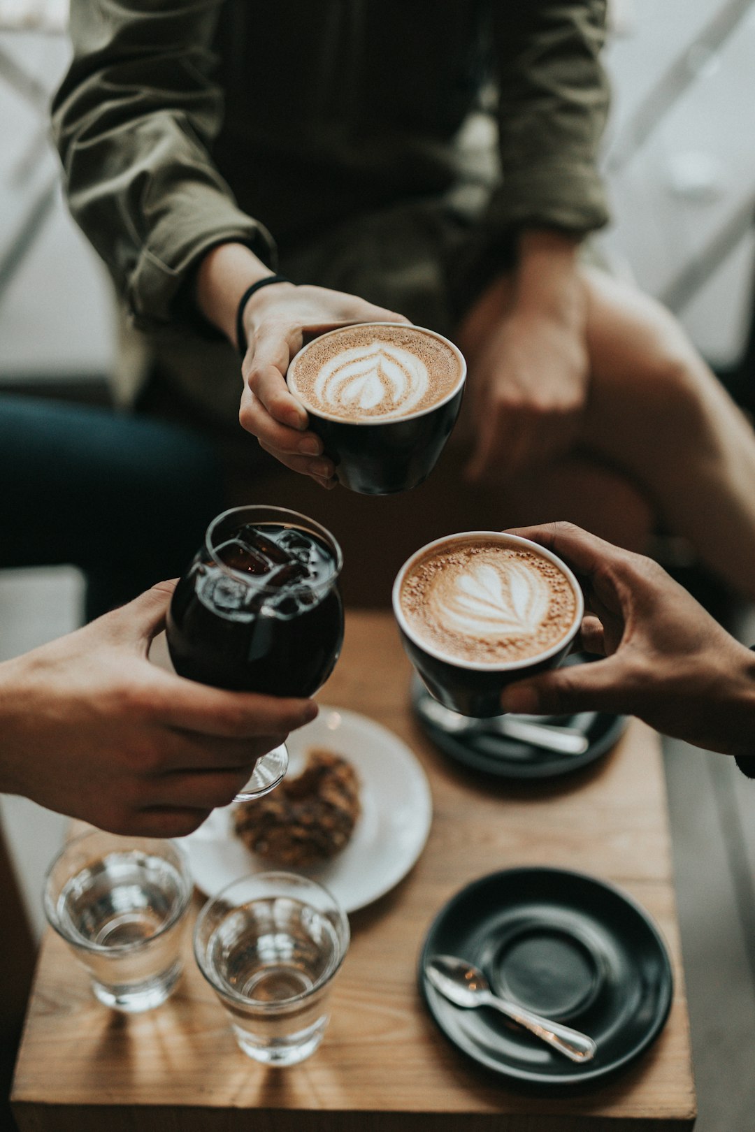 three-person-holding-mug-and-glass-with-beverage-inside-71u2foofi-u